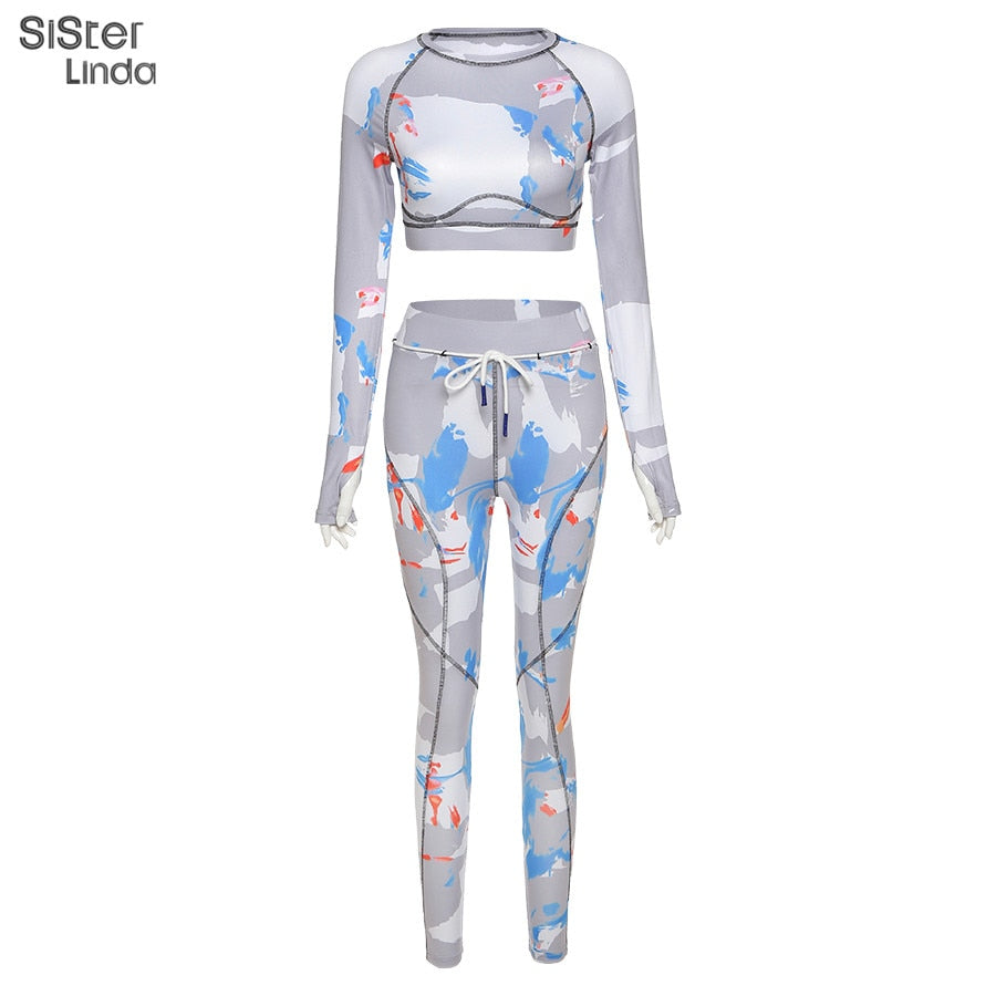 Conjunto deportivo ajustado de dos piezas para mujer