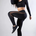Leggings de yoga de cintura alta con paneles de malla