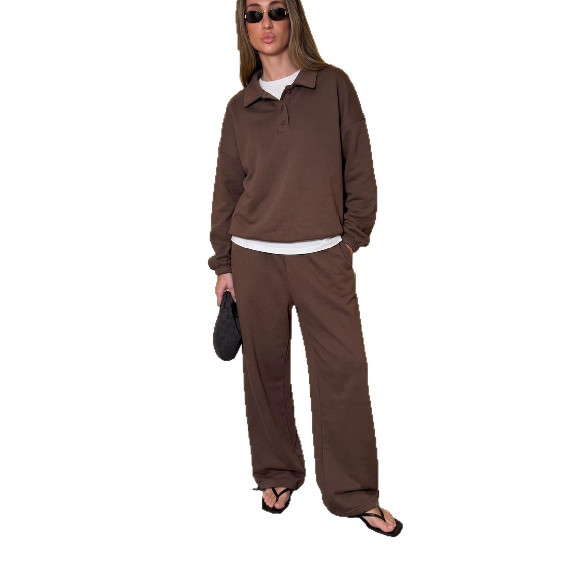Conjunto deportivo con polo de manga larga y pantalón ancho