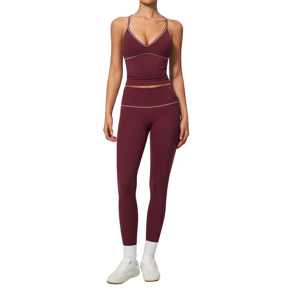 Conjunto deportivo de verano para mujer: top corto con cuello en V y leggings de cintura alta, con control de abdomen y diseño ajustado.