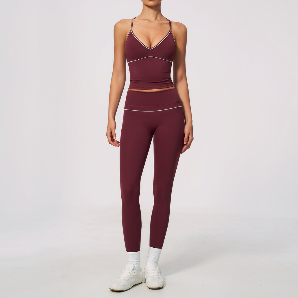 Conjunto deportivo de verano para mujer: top corto con cuello en V y leggings de cintura alta, con control de abdomen y diseño ajustado.