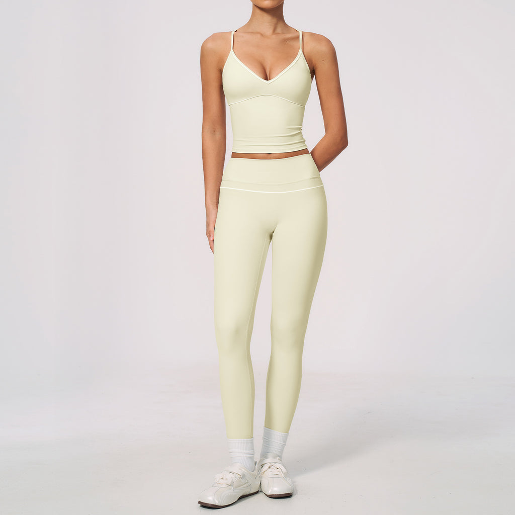 Conjunto deportivo de verano para mujer: top corto con cuello en V y leggings de cintura alta, con control de abdomen y diseño ajustado.