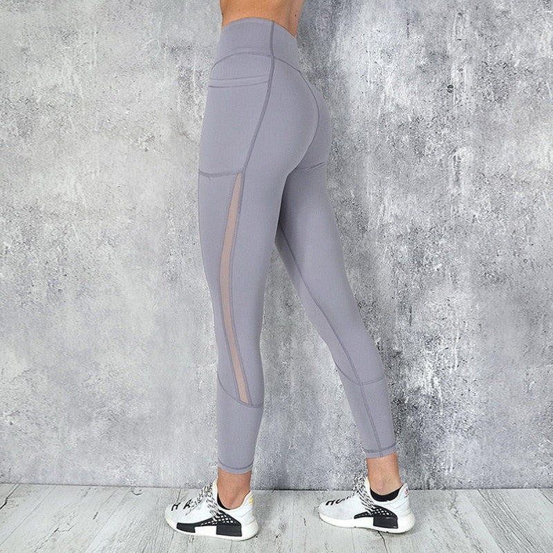 Leggings negros de yoga con bolsillo para móvil