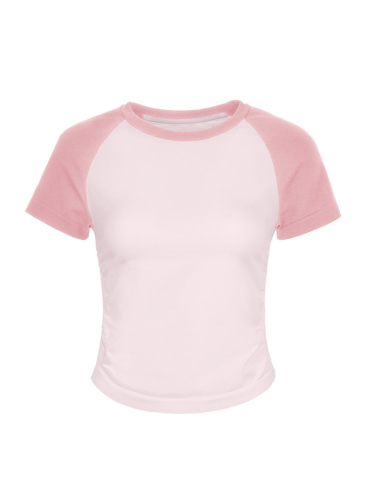 Camiseta deportiva entallada de moda con manga raglán para mujer. Camiseta de manga corta para entrenamiento, running y uso casual, de secado rápido.