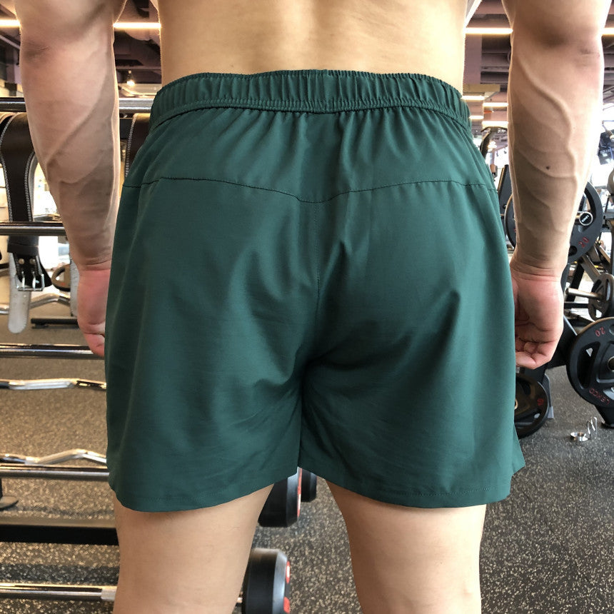 Pantalón corto deportivo de tres cuartos para hombre