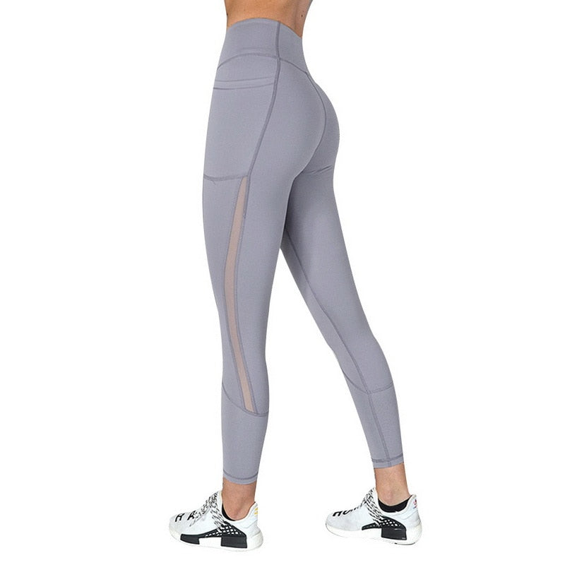 Leggings negros de yoga con bolsillo para móvil