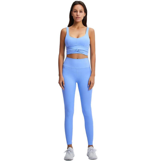 Conjunto deportivo acanalado de top y leggings para mujer