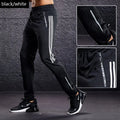 Pantalón deportivo de hombre para correr y entrenar, con bolsillos con cremallera